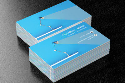 Lampka biurowa na niebieskim tle, Budownictwo, Oświetlenie - Wizytówki Netprint